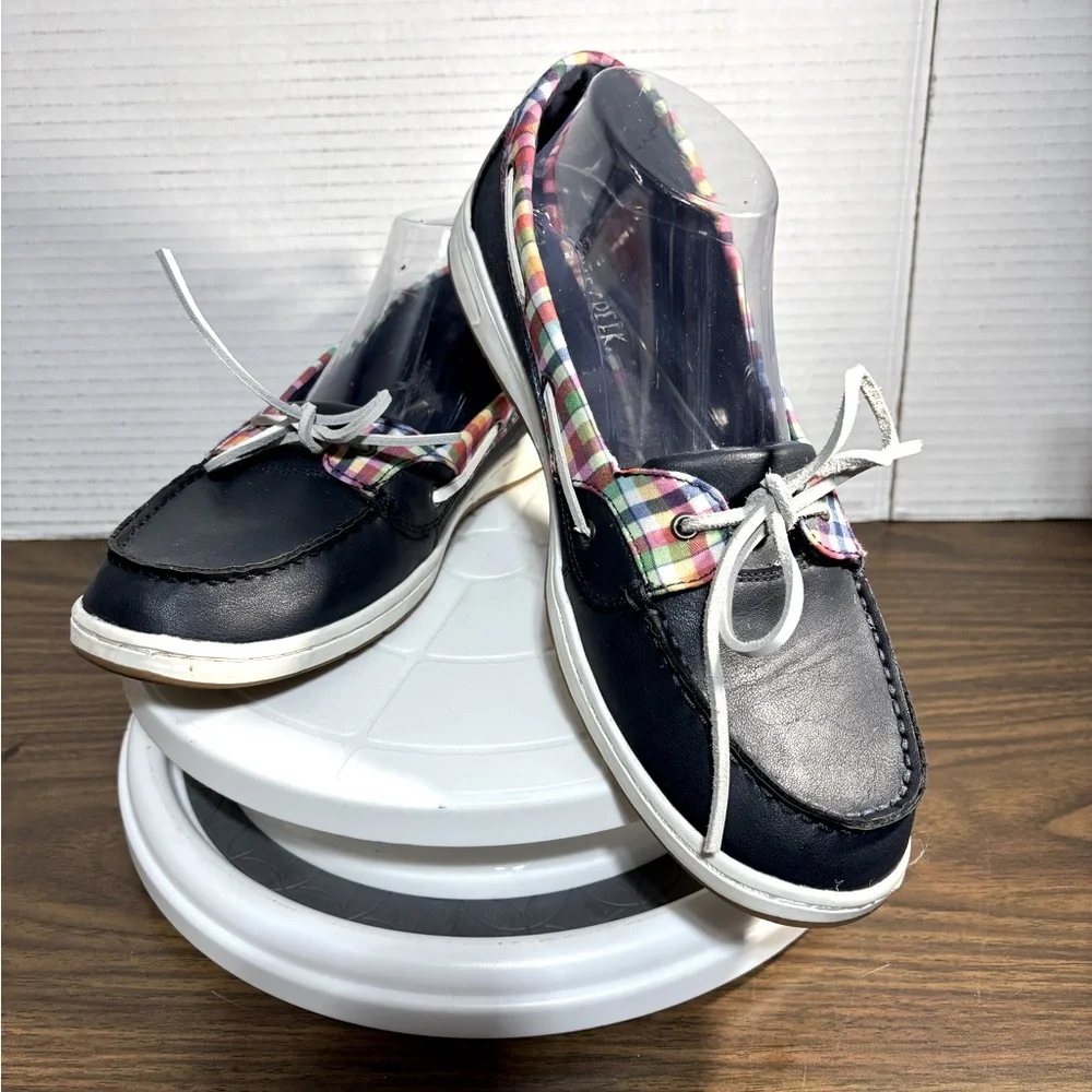 Falls Creek women’s 11 boat or deck shoes. Leather laces navy w/red & white trim